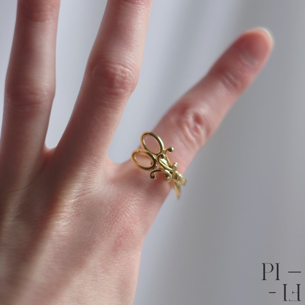 Golden scissors adjustable ring